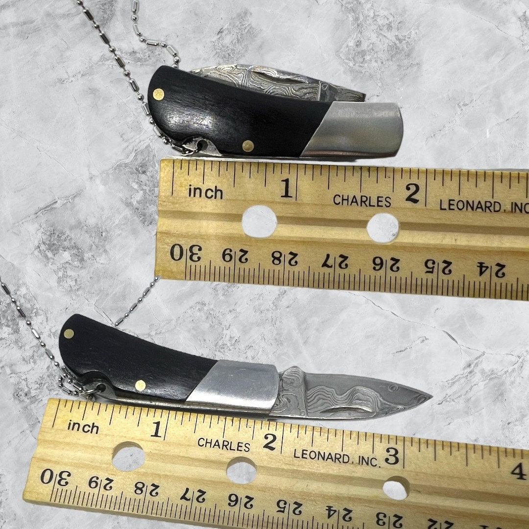 Black Wood Handled Pocket Knife with a Damascus Blade Necklace